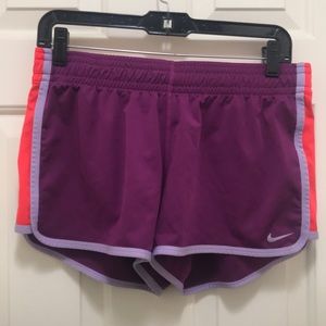 Nike purple and orange small shorts